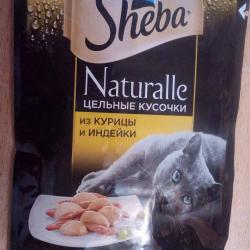 Фото консервированного полнорационного корма «Шеба Натуралле» с курицей и индейкой для взрослых кошек